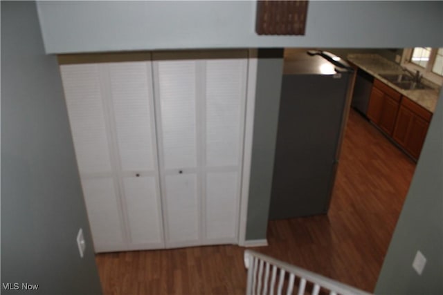 interior space featuring sink and dark wood-type flooring