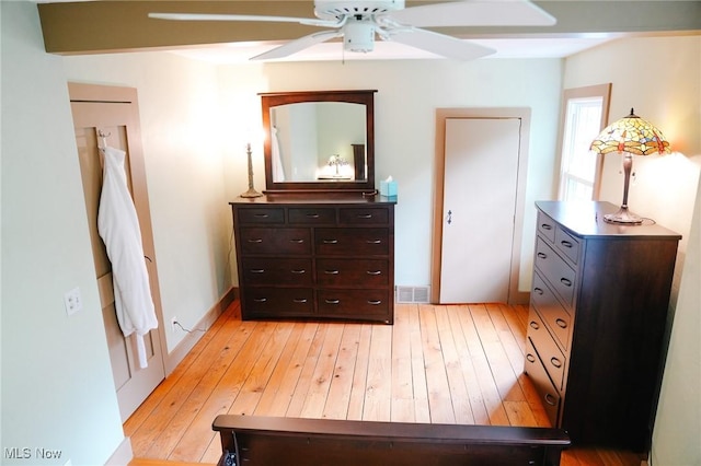 bedroom with ceiling fan and light hardwood / wood-style floors