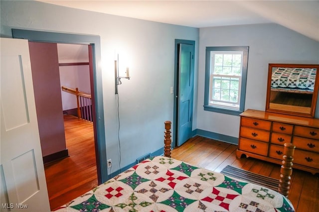 4101 Canfield Rd, Canfield, OH 44406 - bedroom with wood-type flooring and lofted ceiling