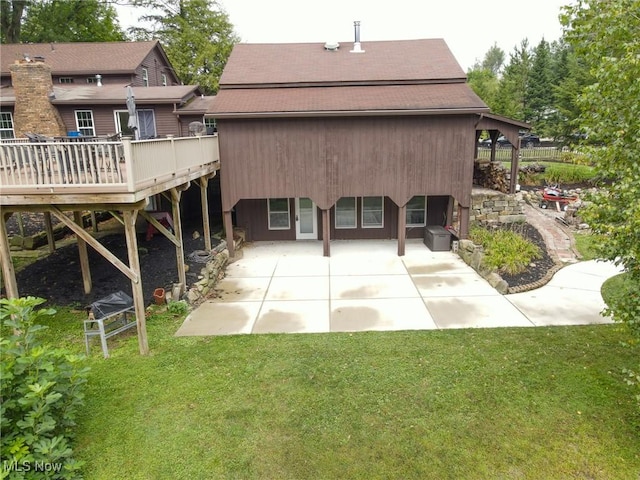 4101 Canfield Rd, Canfield, OH 44406 - rear view of house with a patio, roof with shingles, a lawn, and a deck