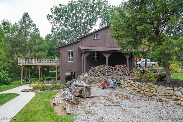 4101 Canfield Rd, Canfield, OH 44406 - view of property exterior with a deck and a lawn