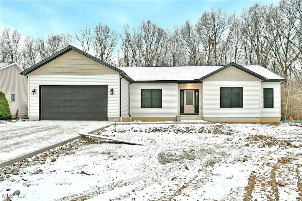 single story home with a garage