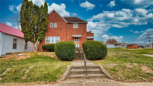 view of front of property with a front lawn