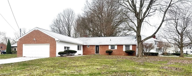 ranch-style home with a garage and a front lawn