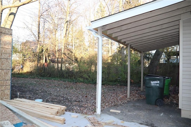 view of yard featuring a carport