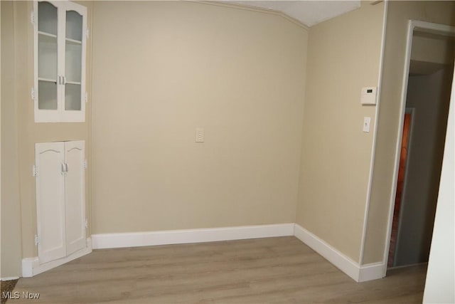 unfurnished room featuring light wood-type flooring