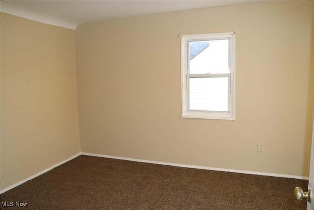 view of carpeted spare room