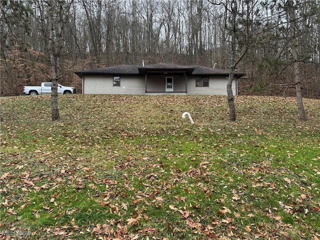 exterior space with a lawn