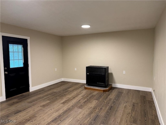 entrance foyer featuring dark hardwood / wood-style floors