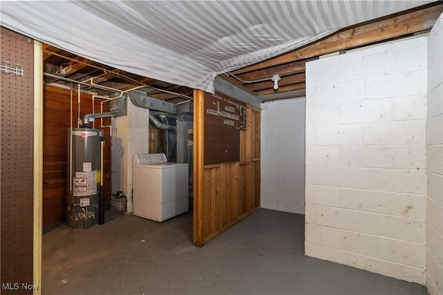 basement with washer / dryer and water heater