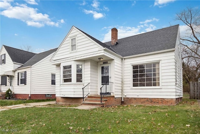 view of front of home featuring a front lawn