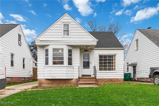 bungalow with a front lawn