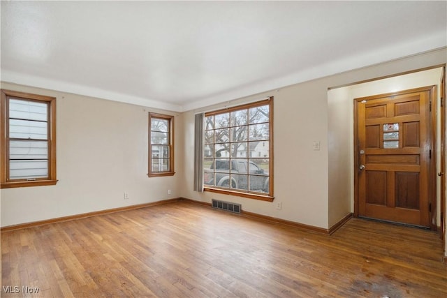 foyer with hardwood / wood-style flooring