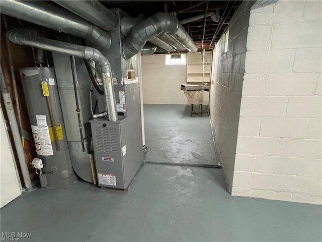 basement with heating unit and water heater