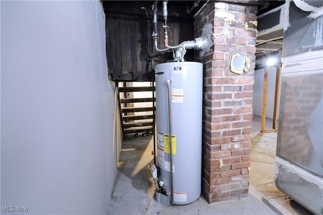 utility room with gas water heater