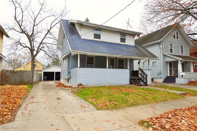 view of front of property with an outbuilding and a garage