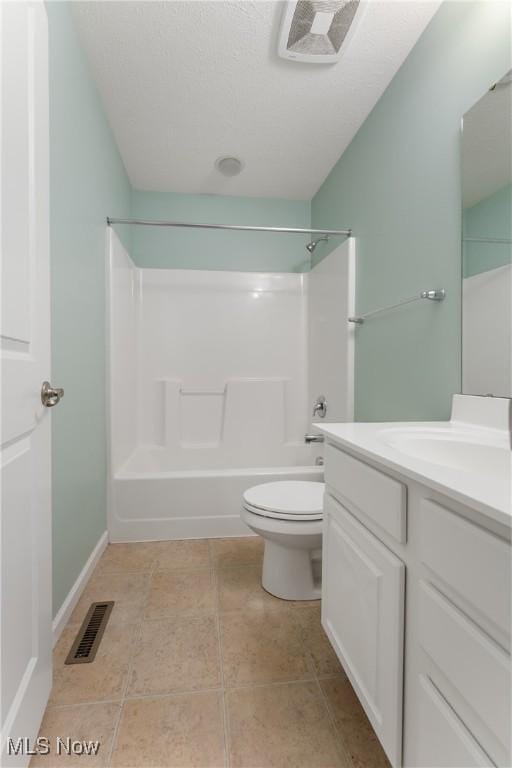 full bathroom with shower / tub combination, tile patterned flooring, vanity, and toilet