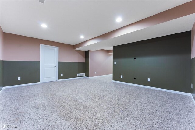 basement with carpet flooring