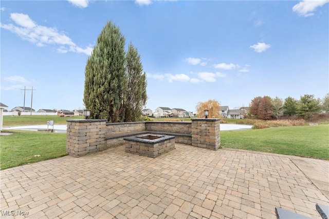 view of patio / terrace featuring a fire pit