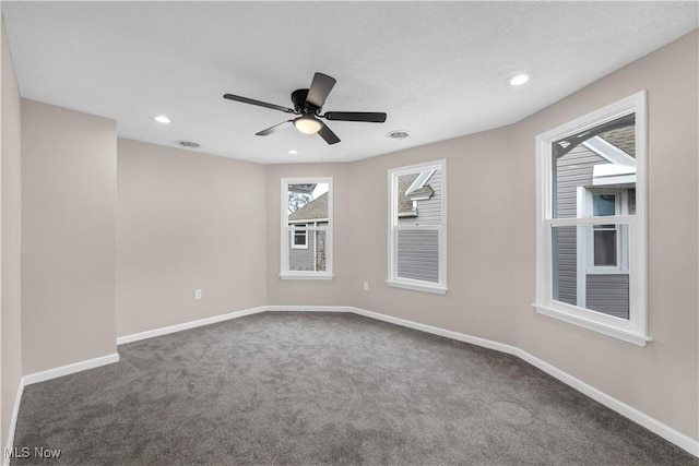 carpeted empty room with ceiling fan