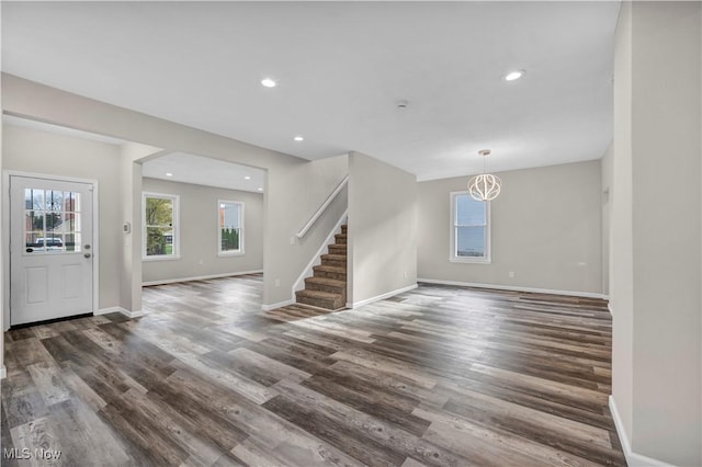 entrance foyer featuring dark hardwood / wood-style flooring