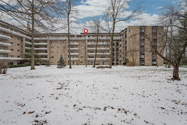 view of snow covered property