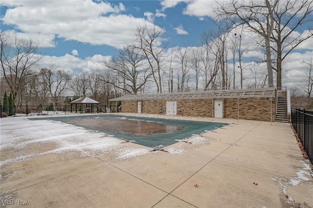 view of swimming pool featuring a patio