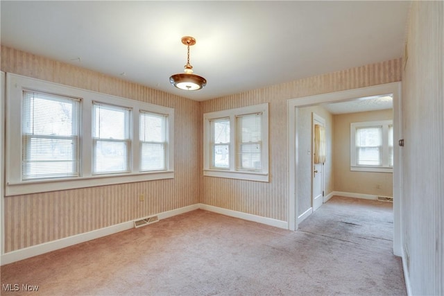 view of carpeted spare room