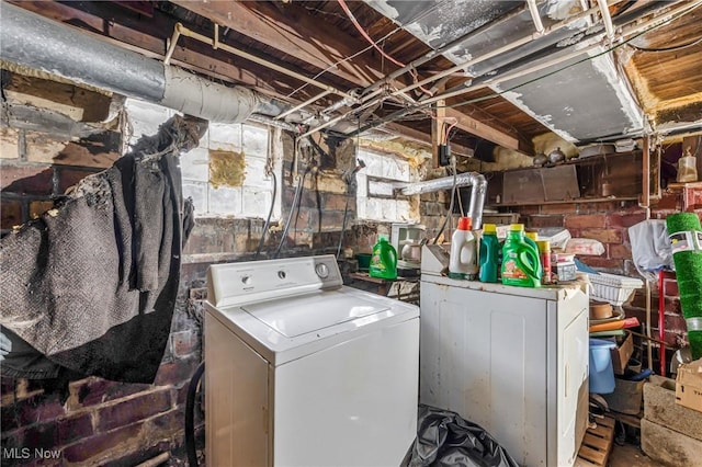 clothes washing area featuring washer / clothes dryer