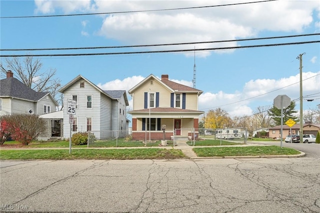 view of front property featuring a porch