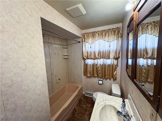 full bathroom featuring vanity, shower / bathtub combination, and toilet