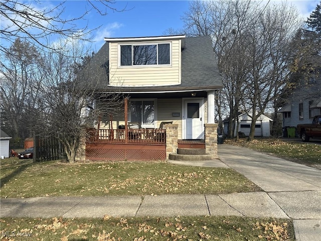 view of front of home featuring a porch and a front yard