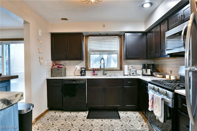 kitchen with decorative backsplash, appliances with stainless steel finishes, dark brown cabinets, sink, and light tile patterned floors