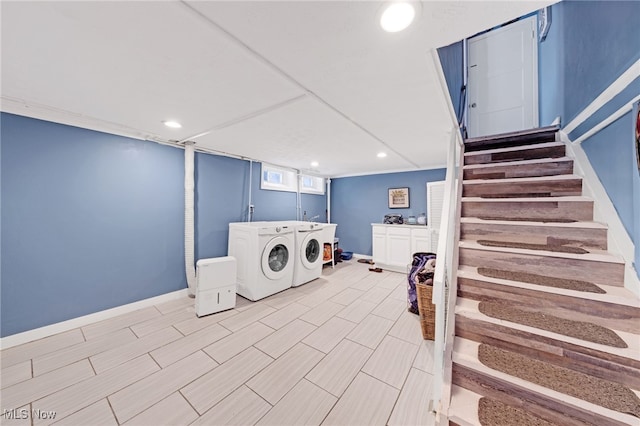 washroom featuring washer and clothes dryer