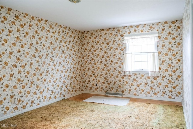 empty room featuring hardwood / wood-style floors