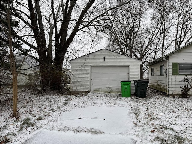 view of snow covered garage