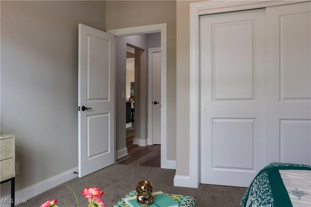 carpeted bedroom with a closet