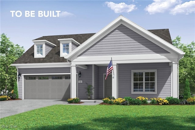 view of front facade with a front yard and a garage