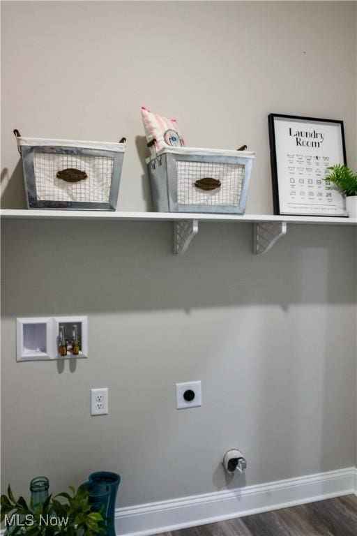 washroom featuring dark hardwood / wood-style flooring, hookup for a washing machine, and hookup for an electric dryer