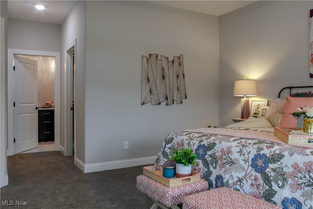 bedroom featuring dark colored carpet