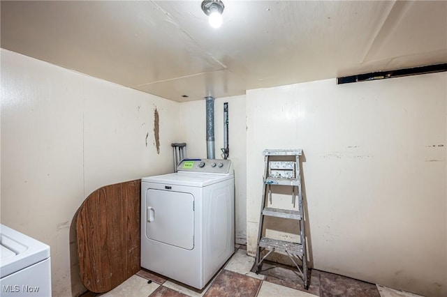 washroom featuring washer / clothes dryer