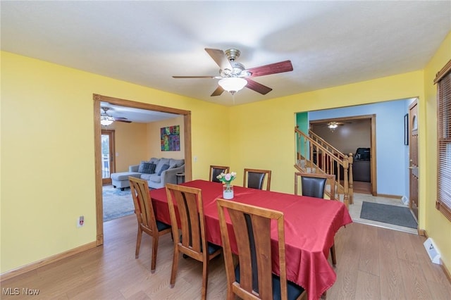 dining room featuring light wood-type flooring