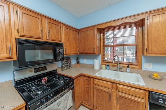 kitchen featuring black appliances and sink