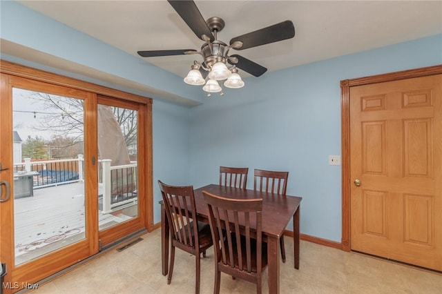 dining area with ceiling fan