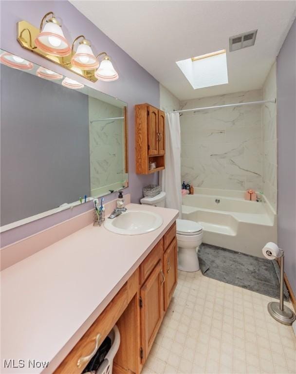 full bathroom with shower / bath combo, toilet, vanity, and a skylight