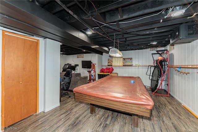 basement with wood-type flooring and pool table