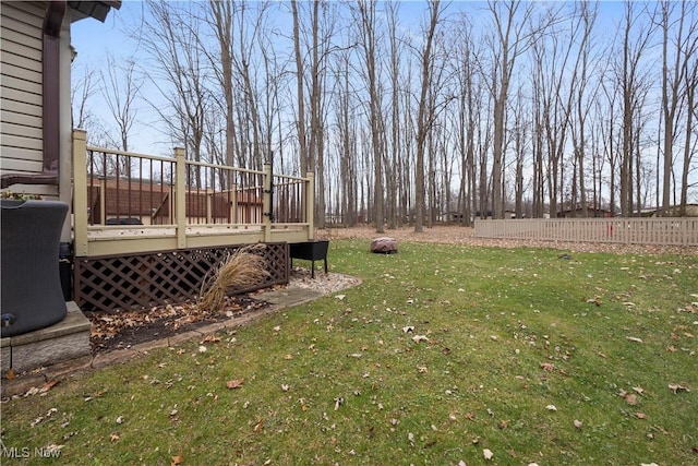 view of yard featuring a wooden deck