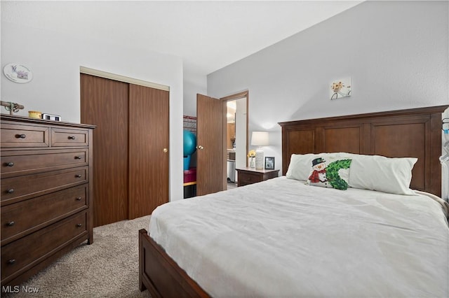 carpeted bedroom with a closet