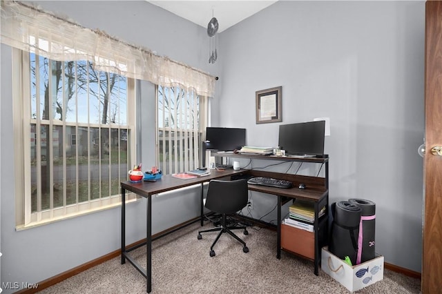 view of carpeted office space