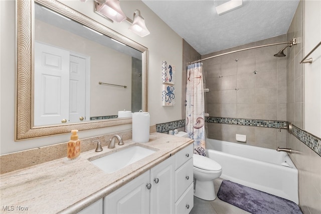 full bathroom featuring shower / tub combo, vanity, a textured ceiling, tile patterned flooring, and toilet